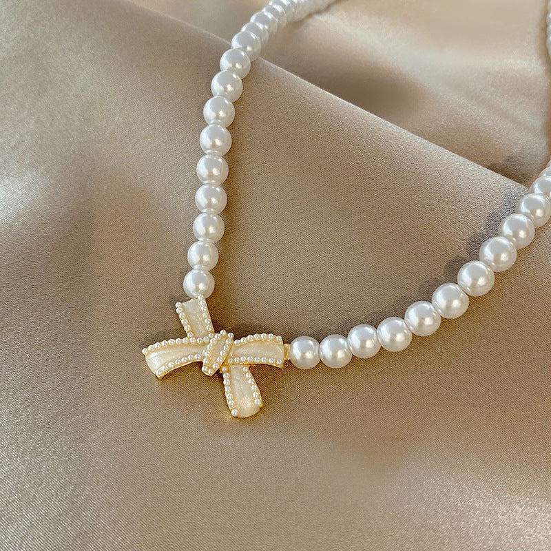 Gold Bow Pearl Necklace